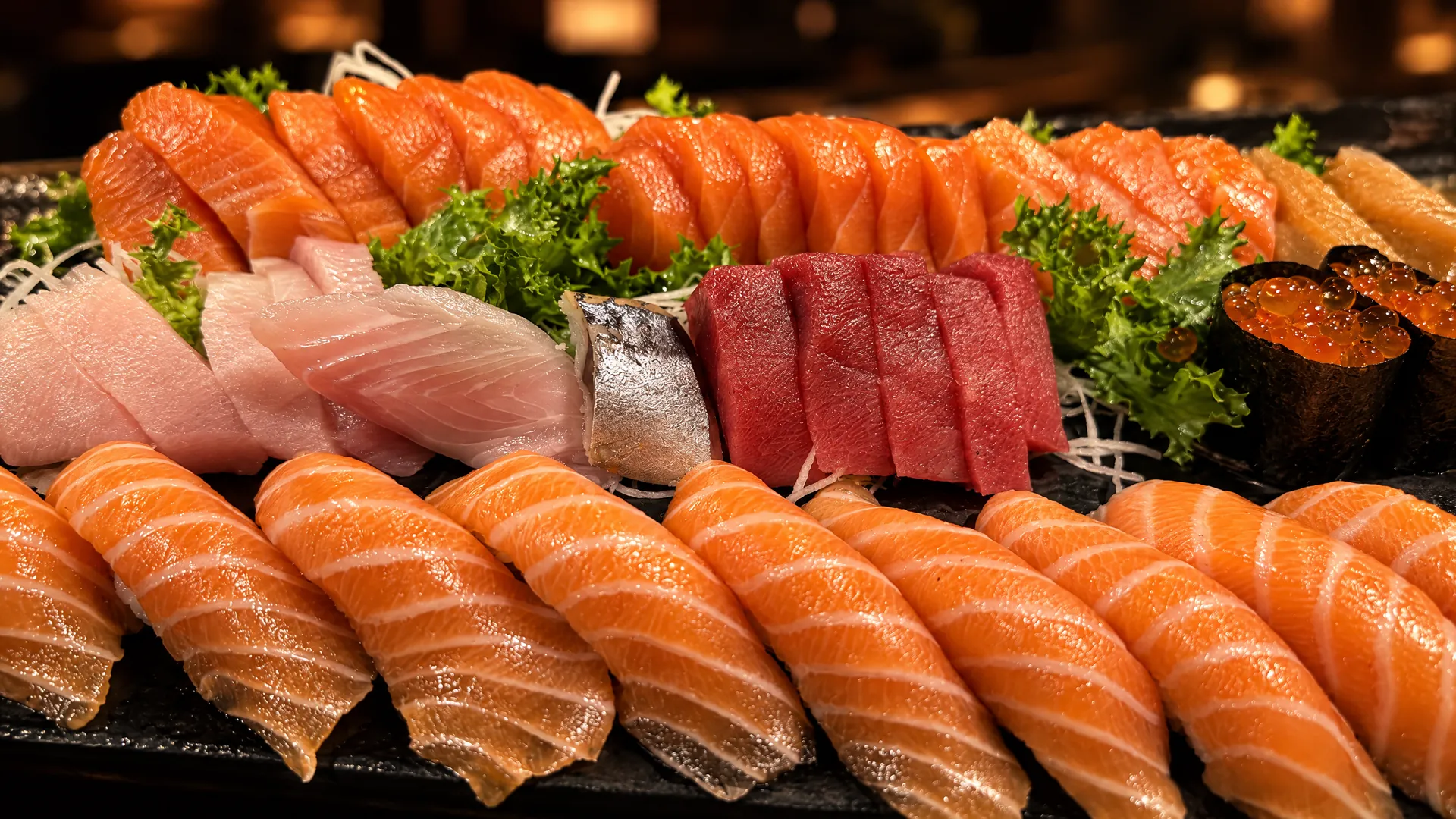 Large platter of salmon nigiri, tuna and sashimi at Kikoo Sushi East Village